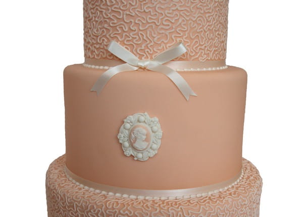 Wedding cake with sugar paste brooch