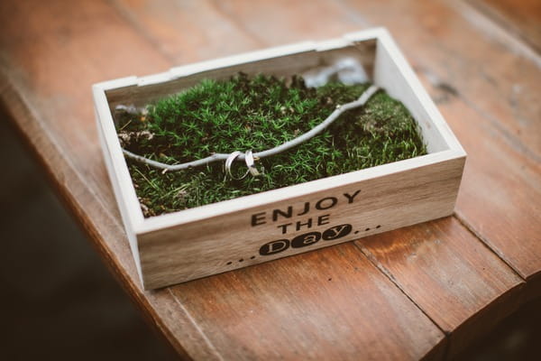 Wedding rings in box of moss