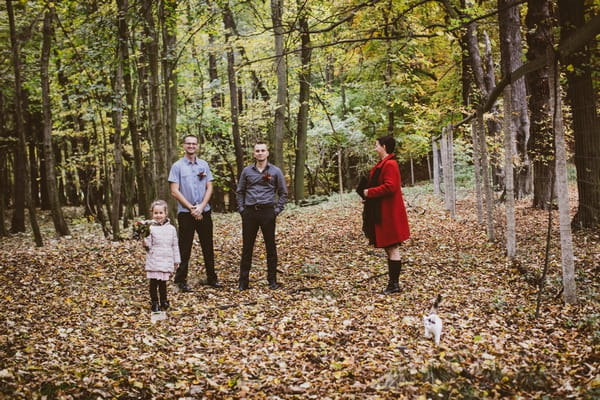 Groom, best man, flower girl and celebrant waiting for bride