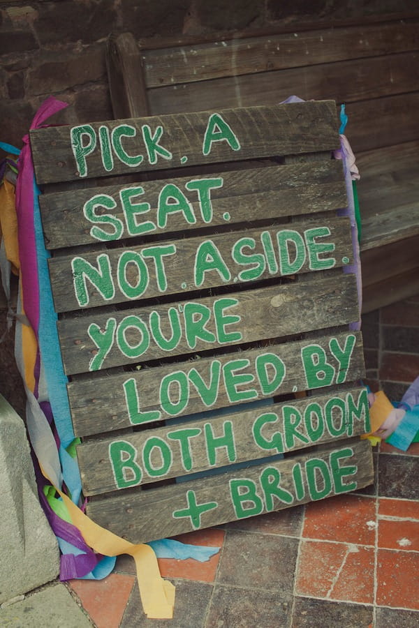 Pick a seat wedding sign