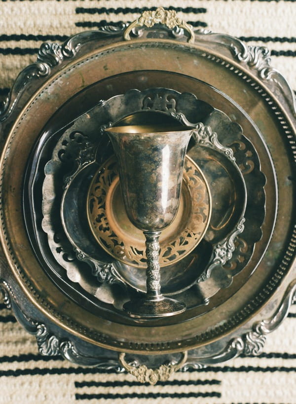 Goblet on stack of chargers