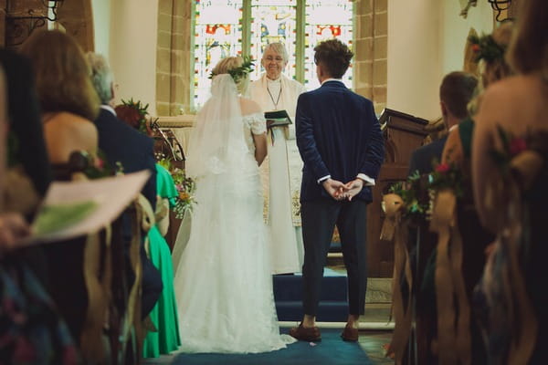 Bride and groom at altar