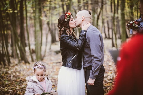 Bride and groom kiss