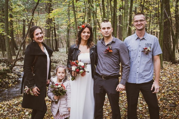 Group shot at intimate forest wedding