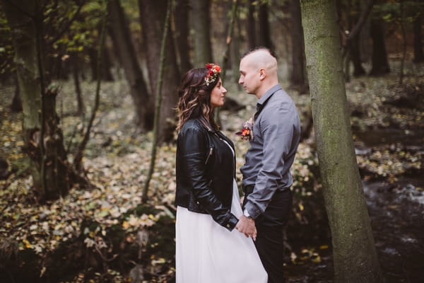 Bride and groom standing face to face