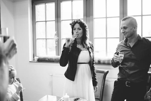 Bride sipping drink