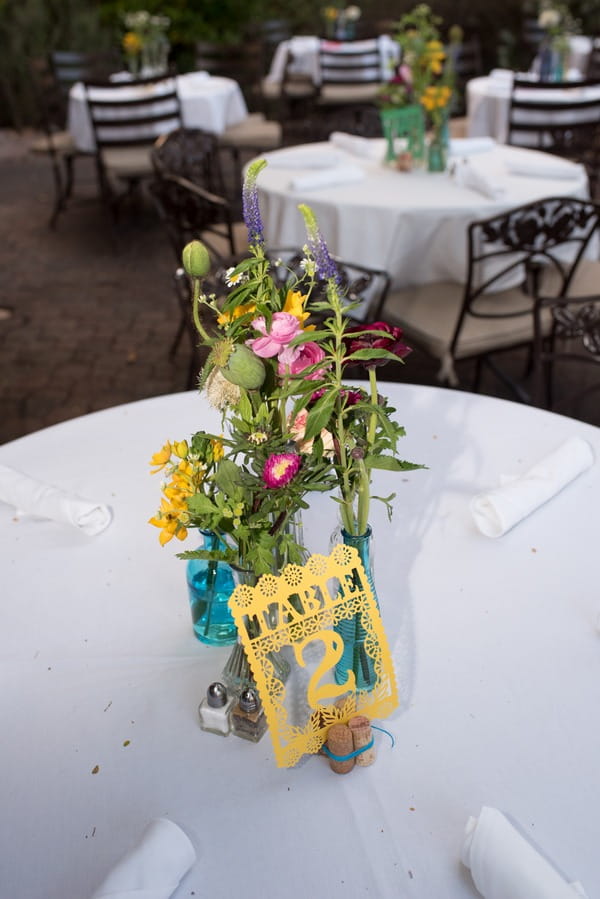 Flowers and Mexican themed wedding table number
