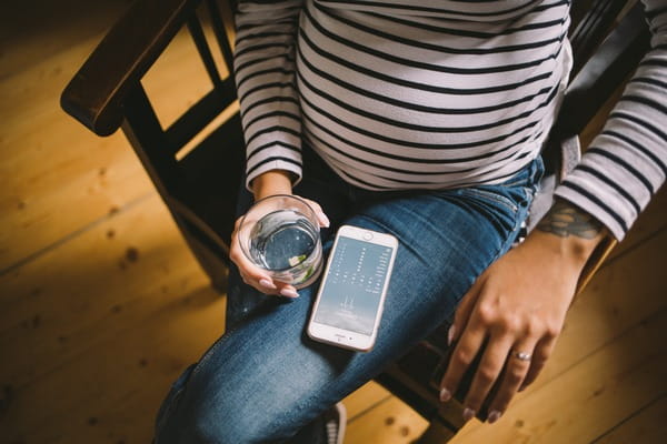 Bride-to-be checking weather on phone