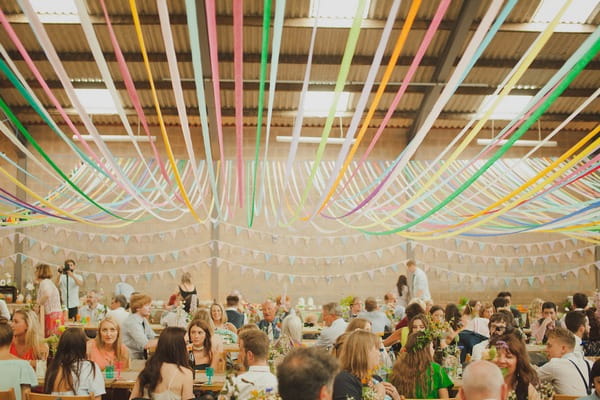 Streamers hanging from ceiling of aircraft hangar