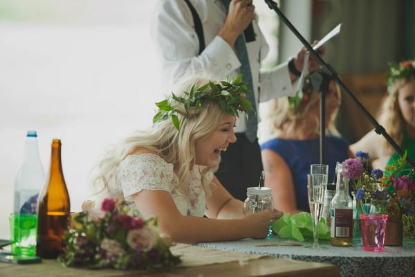 Bride laughing at speech