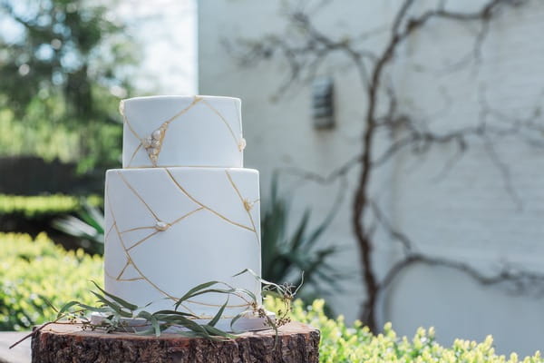 Wabi-sabi wedding cake with cracked icing design