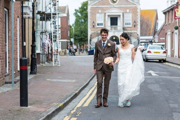 Bride and groom in road in Poole