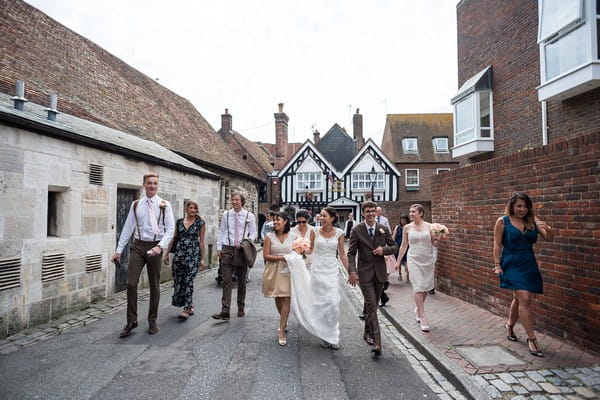 Wedding party walking to reception