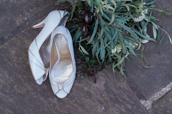 Bridal shoes and bridal bouquet