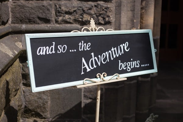 And so the adventure begins sign