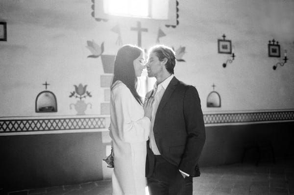 Bride and groom in El Presidio Chapel