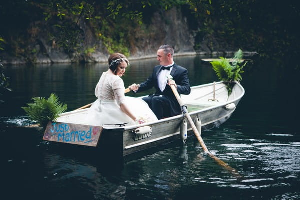 Bride and groom in rowing boat - Picture by Martin Bulmer Photography