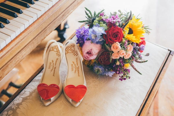 Vivienne Westwood bridal shoes next to bouquet
