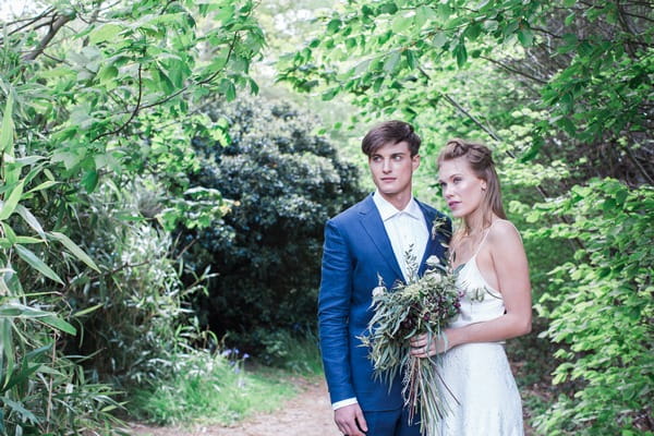 Bride and groom in grounds of Pembroke Lodge