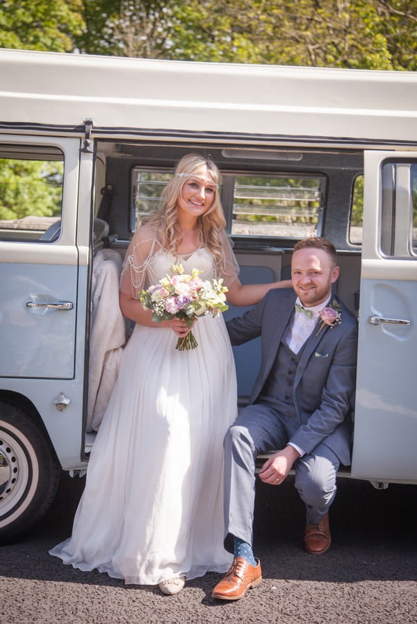 Bride and groom in camper van