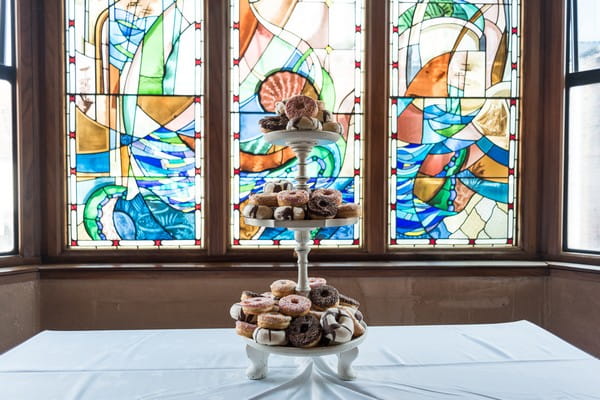 Cake stand of doughnuts at wedding