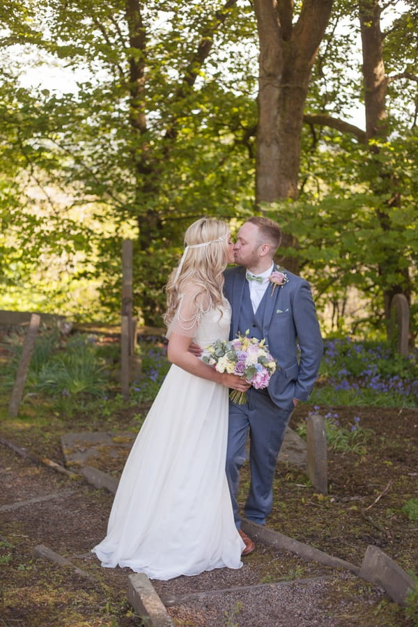 Bride and groom kissing