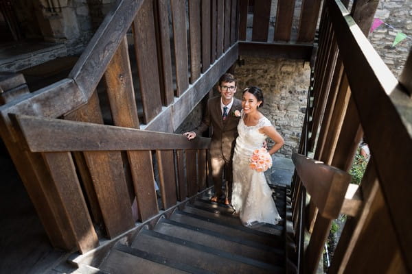 Bride and groom on steps inside Scaplen's Court