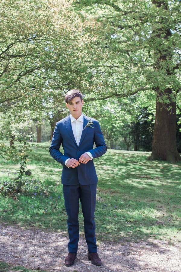 Groom in blue suit