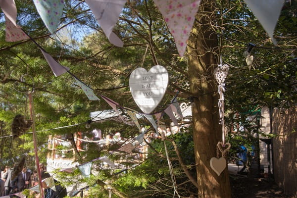 Wedding decor hanging from tree