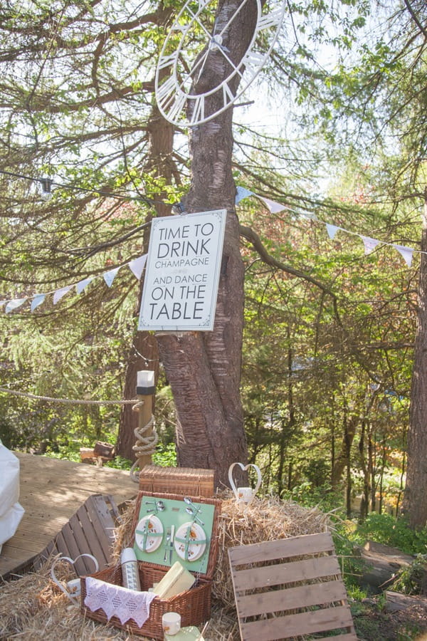 Sign on tree at wedding