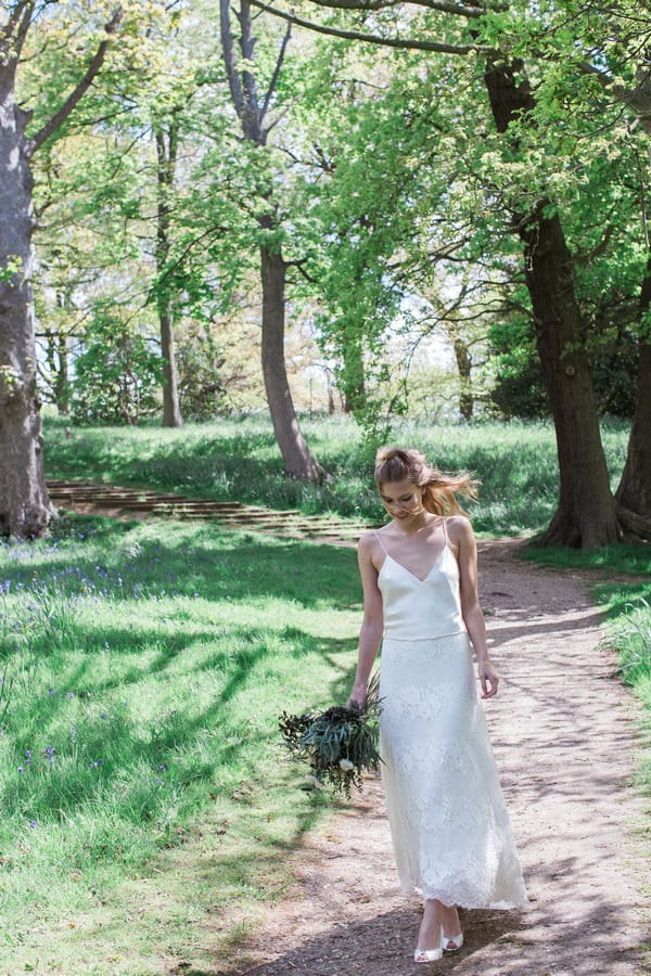 Bride walking on path