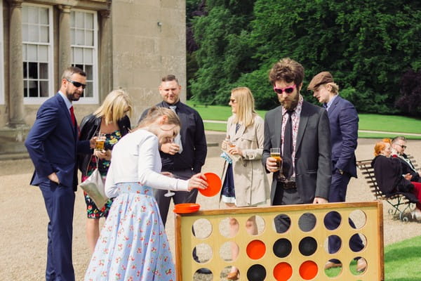 Wedding guest playing giant Connect 4