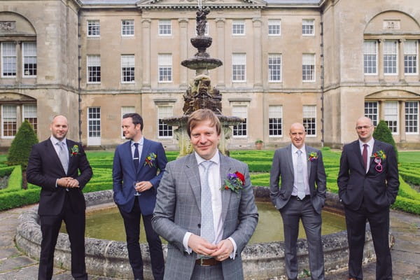 Groomsmen in front of Sledmere House fountain