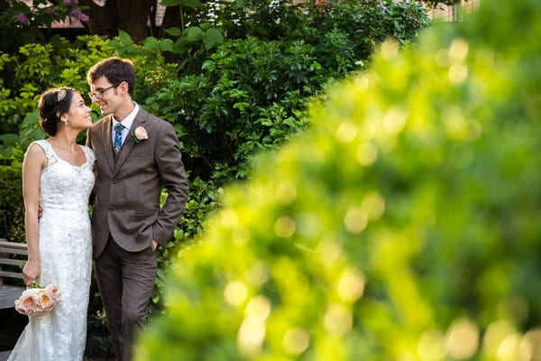 Bride and groom in garden at Scaplen's Court