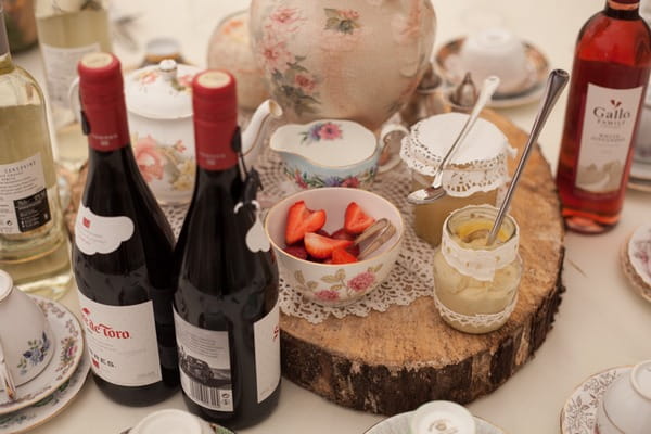 Wine and strawberries on wedding table