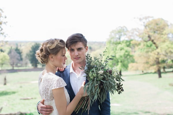 Groom staring at camera