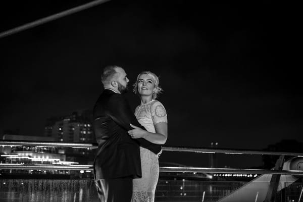 Manchester backdrop behind bride and groom