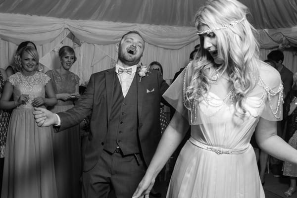 Bride and groom dancing