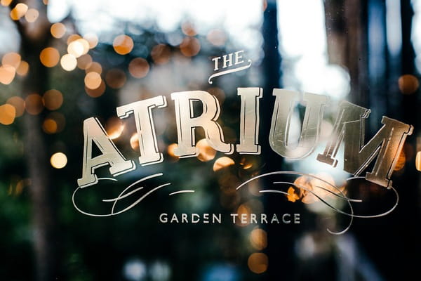 The Atrium Garden Terrace sign in window