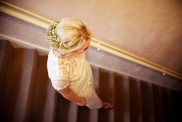 Bride walking down stairs