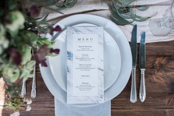 Menu at wedding place setting