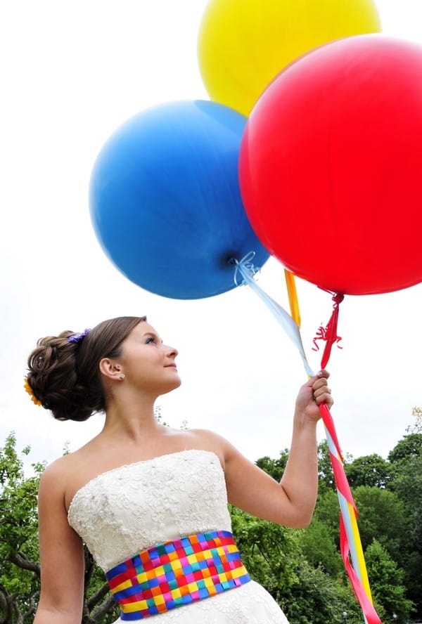Bride Holding Colourful Balloons