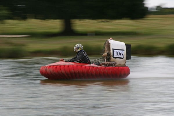 Man racing hovercraft