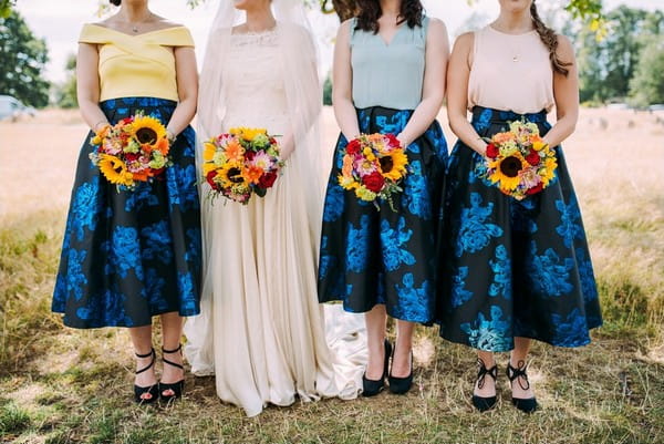 Bride and bridesmaids colourful wedding bouquets