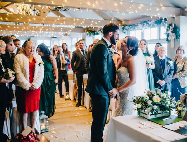 Bride and groom at altar