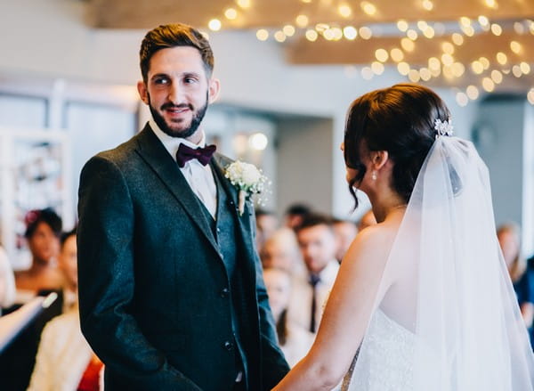 Bride and groom saying wedding vows