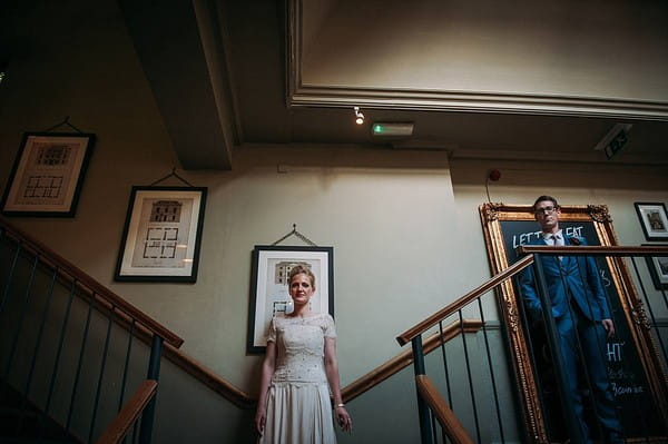 Bride and groom on stairs at The Bickley