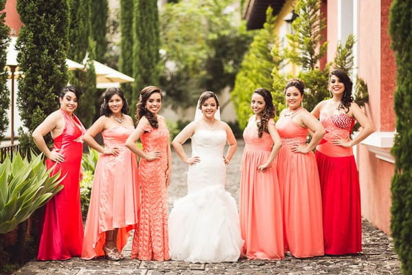 Bride with bridesmaids in mismatched mink dresses