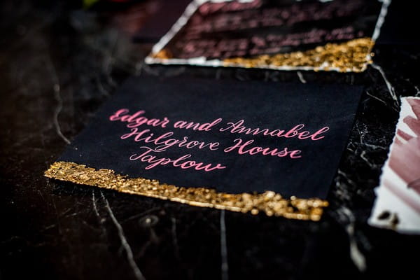 Black and gold wedding stationery