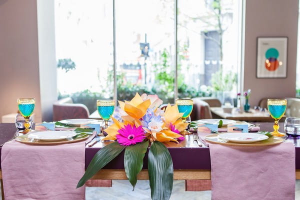 Wedding table with bright colourful styling
